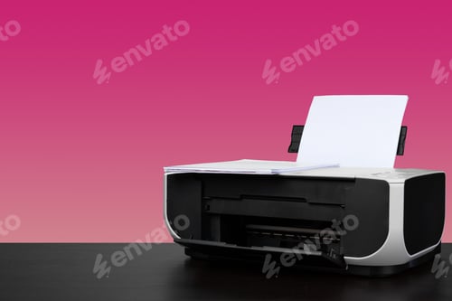 Preview: Compact home laser printer against pink background