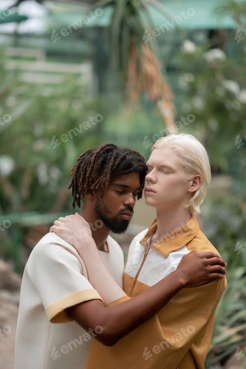 Preview: Two stylish men posing in the greenhouse for magazine cover