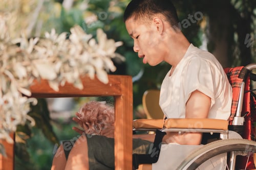 Preview: Disabled child on the wheelchair with the girl doll in hands, Sometime Toy is best friend.