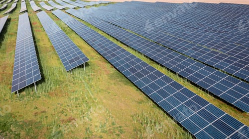 Preview: Aerial view of solar photovoltaic panels in spring
