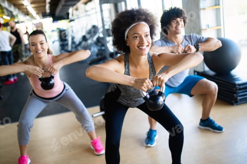 Preview: Picture of cheerful fitness team in gym