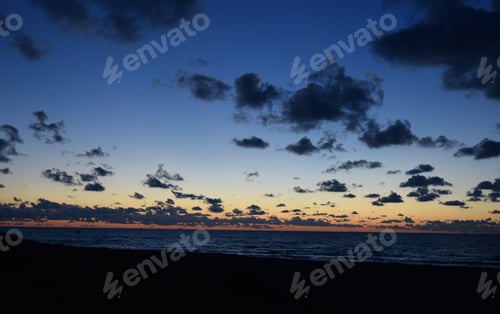 Preview: Sunset on cloudy sky backgound. Pathos, Cyprus