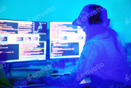 Preview: Hacker, programmer and woman typing on laptop in home at night in neon light to hack software. Cybe