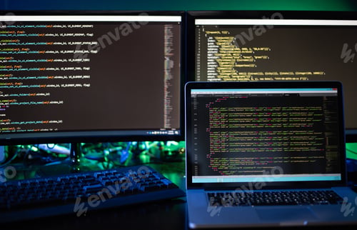 Preview: Three computer screens with computer programming code