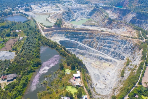 Preview: Aerial view of machine excavator trucks dig coal mining or ore with black grunge ground