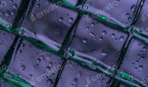 Preview: Close up of wet ice cubes, purple hue, background