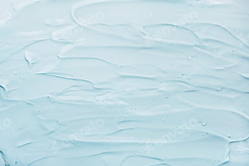 Preview: Liquid gel abstract cosmetic blue background. Smear of transparent moisturizing product