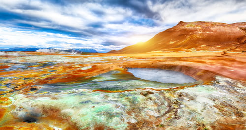 Preview: Boiling mudpots in the geothermal area Hverir and cracked ground around