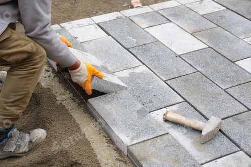 Preview: laying concrete bricks on each other for building a new sidewalk in istanbul