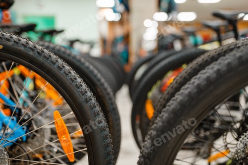 Preview: Rows of cycles in sports shop, focus on wheels
