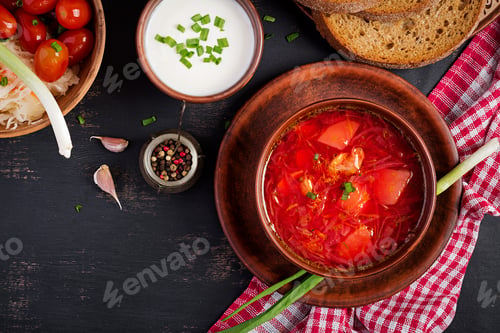 Preview: Traditional Ukrainian Russian borscht or red soup on the bowl. Top view