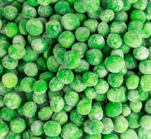 Preview: Close up of frozen green peas.