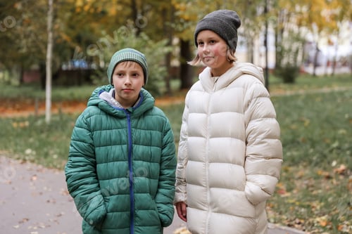 Preview: Children walk in the autumn park