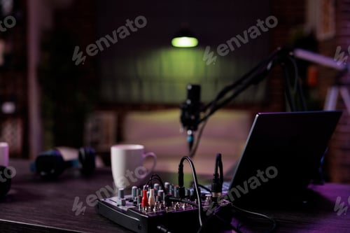 Preview: Empty desk with podcast equipment to record live talking show