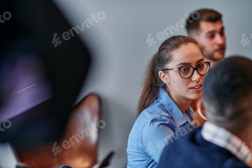 Preview: Businesswoman Leading Discussion in Modern Office Setting