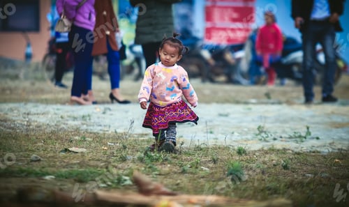 Preview: innocent child walking in the market