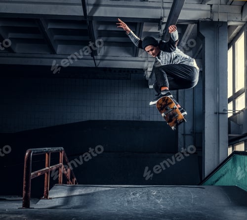 Preview: Young skateboarder at skate park indoor