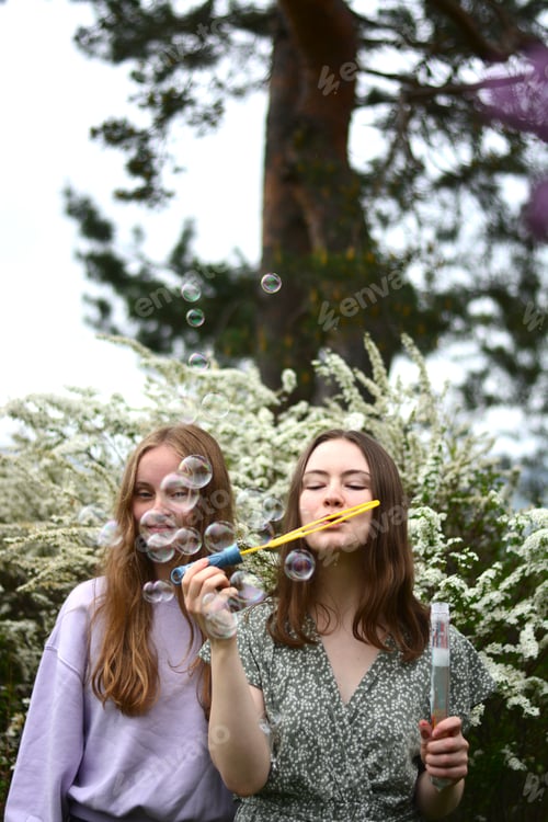Preview: Girls blowing bubbles