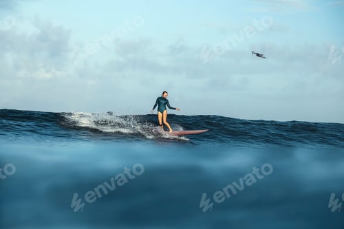 Preview: Female Surfer and drone, Bali, Indonesia