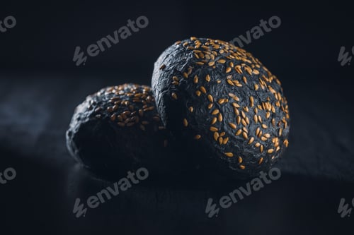 Preview: Black bun. Dark pastry with sesame seeds.