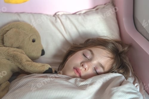 Preview: cute little girl sleeps in bed with soft toy