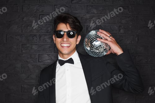 Preview: Happy party man with disco ball