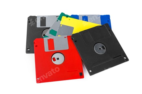 Preview: Colorful collection of floppy disks on a plain background showing vintage storage media