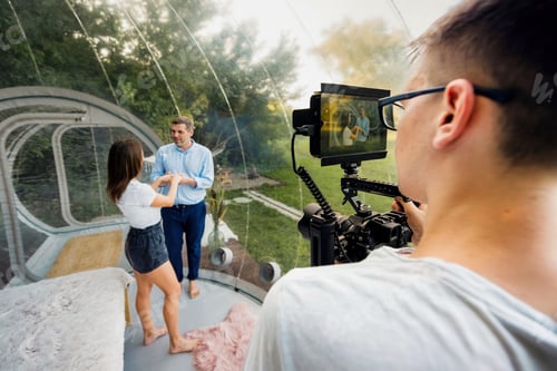 Preview: Photo set of a couple inside tent at glamping