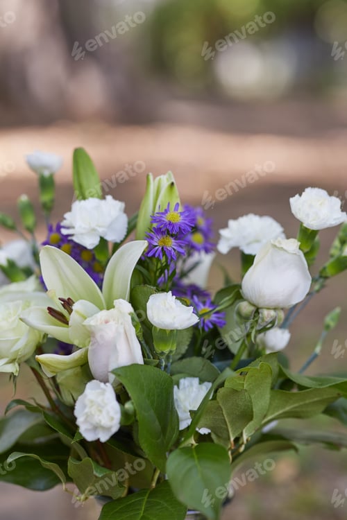 Preview: Vertical photo of fresh colorful flowers with green leaves