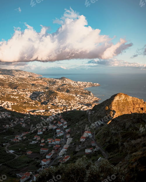 Preview: Stunning Madeira Island featuring residential buildings on the rocky shore