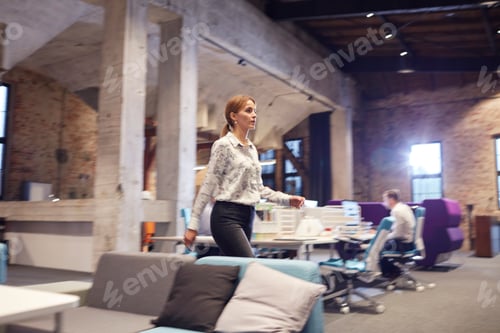 Preview: Busy woman walking in modern office, blurred motion