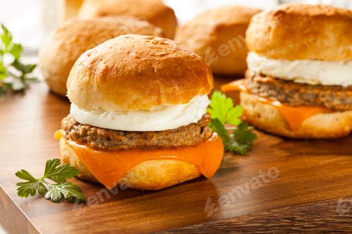 Preview: Gourmet burger sliders topped with cheese and patty