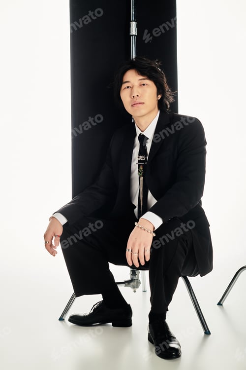 Preview: Youthful elegance shines through in modern fashion statement of a young asian man