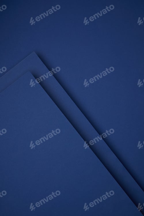 Preview: dark abstract background made from blue colored paper