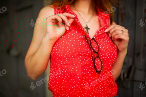 Preview: Woman in Red Polka Dot Shirt with Glasses