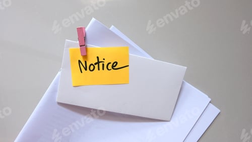 Preview: Notice message concept written post it on envelope.