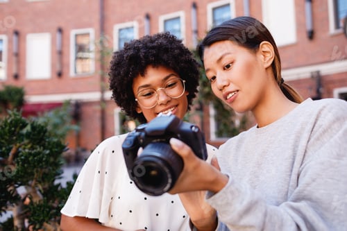 Preview: Photographer showing results of shoot to client