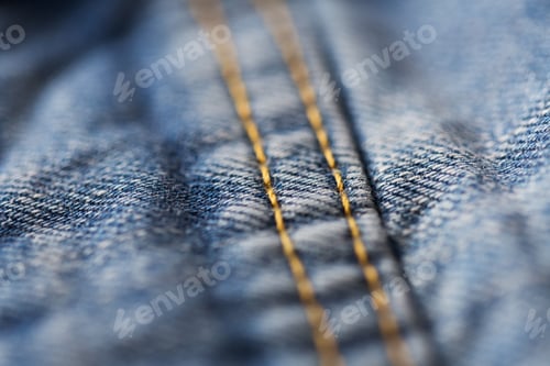 Preview: close up of stitching on denim or jeans clothes