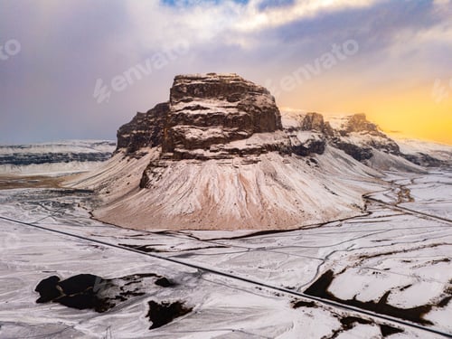 Preview: Snowy Mountain Landscape at Sunrise in Iceland