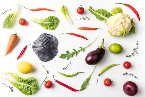 Preview: Top view of different vegetables isolated on white
