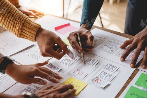 Preview: Ux ui designers come up with new ideas at a meeting to present in office mobile internet software