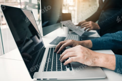 Preview: partnerships developing programming and coding technologies working on laptop