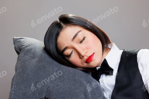 Preview: Waitress resting head on pillow