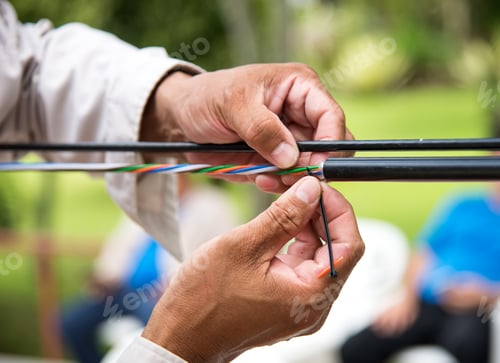 Preview: Technicians are installing optic fiber.