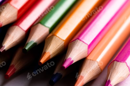 Preview: Close up of multi coloured pencils and copy space on white background