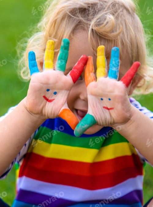 Preview: Child in hand draw smile. Selective focus.