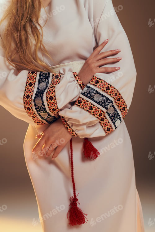 Preview: Enchanting mavka: woman in white dress with red tassel