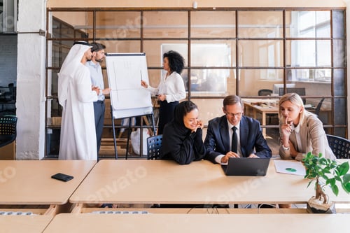 Preview: Multiethnic business team meeting in the office