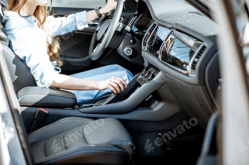 Preview: Woman switching gear at the modern car