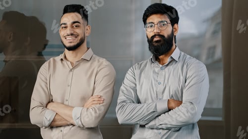 Preview: Two happy male colleagues multiracial diverse businesspeople partners men hispanic man arabian